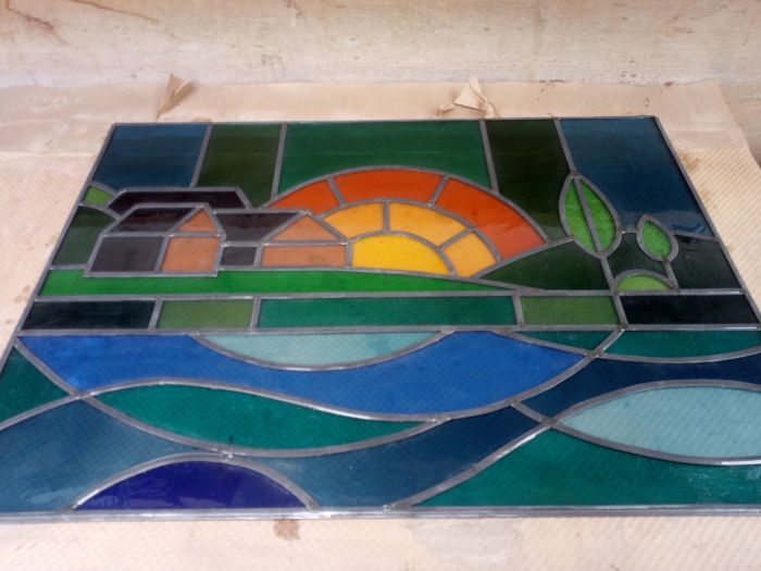 Glas in lood gepatineerd